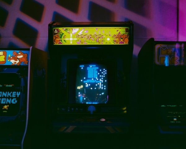 Woodmere-1 A few classic arcade games are lined up against the wall.