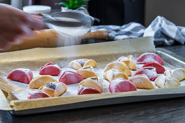 Food being prepared for a Purim party.