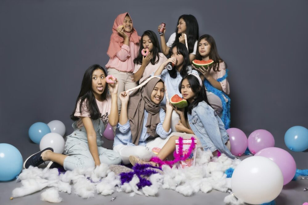 Friends posing for a photo booth photo